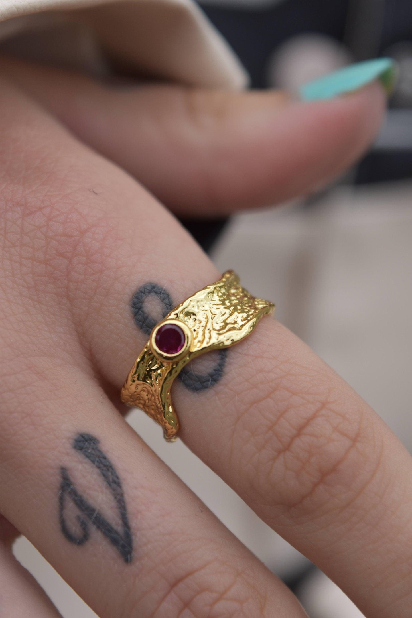 SYNTHRONITE ring